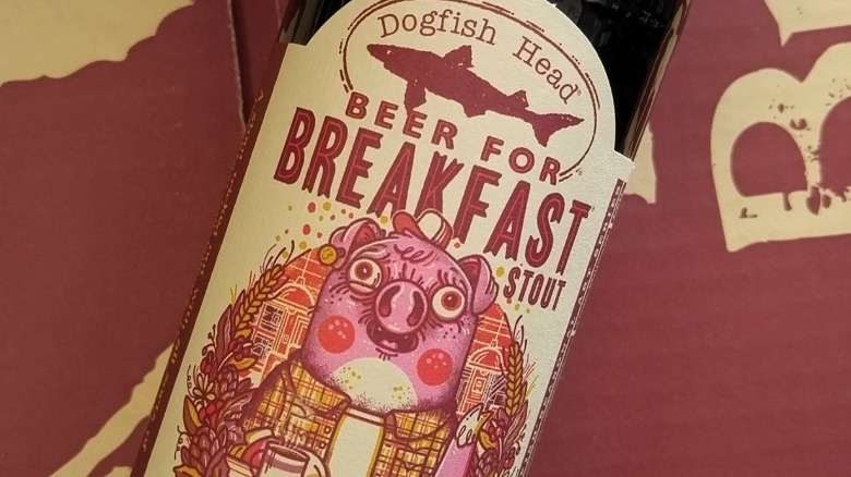 Brown label with the picture of pink pig and red writing