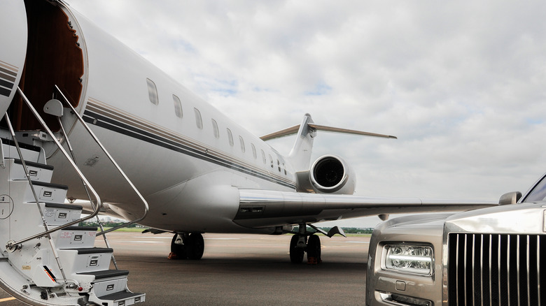 Car pulled up to a private jet