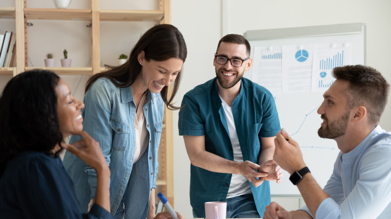 People in a meeting sharing ideas