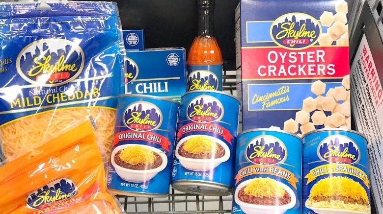 Skyline Chili cans with hot sauce, cheese, and oyster crackers