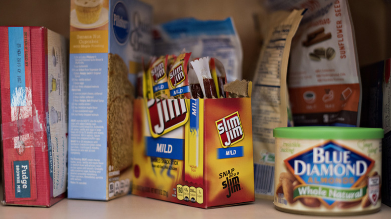 Slim Jims and other snacks on a shelf