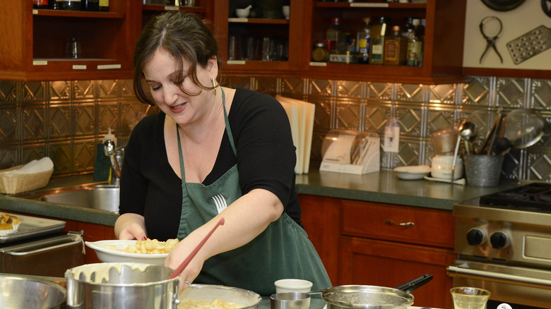 Perelman cooking in kitchen