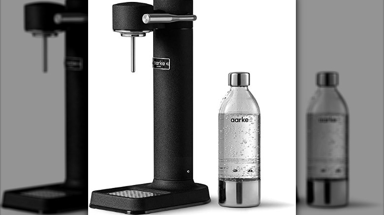 aarke seltzer maker with bottle of water. 