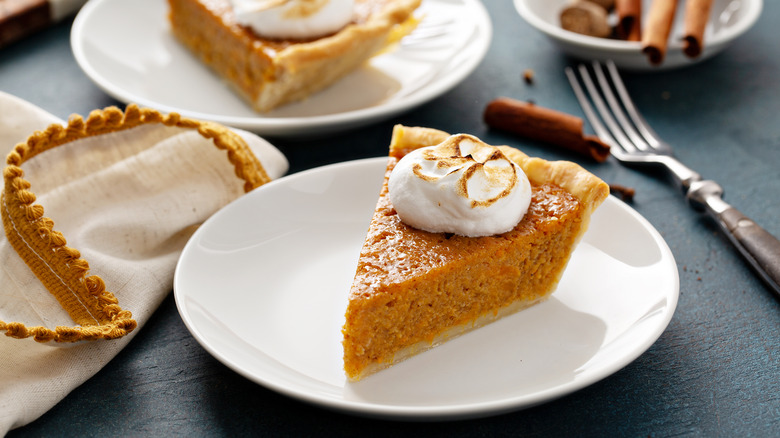 Sweet potato pie slice on a white plate