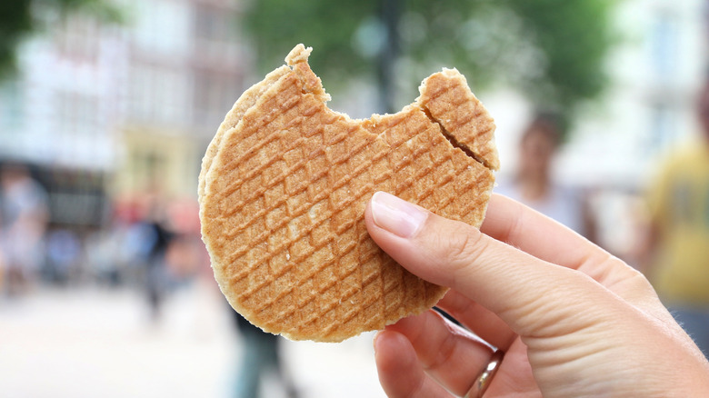 hand holding stroopwafel