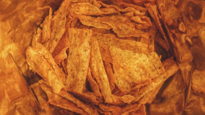 close up of the inside of a bag of cheddar Sun Chips