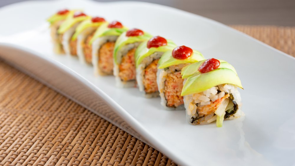 Mexican sushi roll topped with sriracha