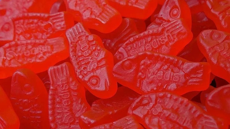 close up of pile of red Swedish fish gummy candies