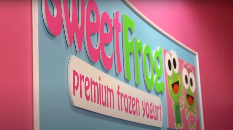 sweetFrog sign in a store