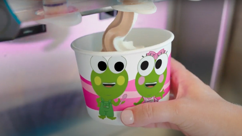 sweetFrog mascots on frozen yogurt cup