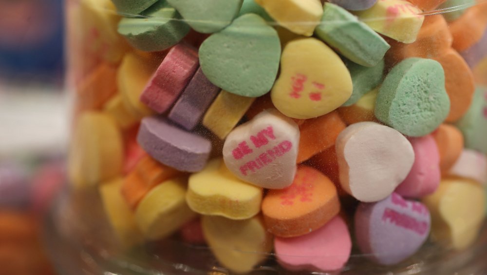 conversation hearts in plastic container