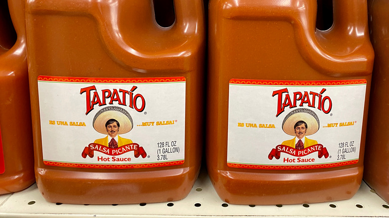 Gallon containers of Tapatio