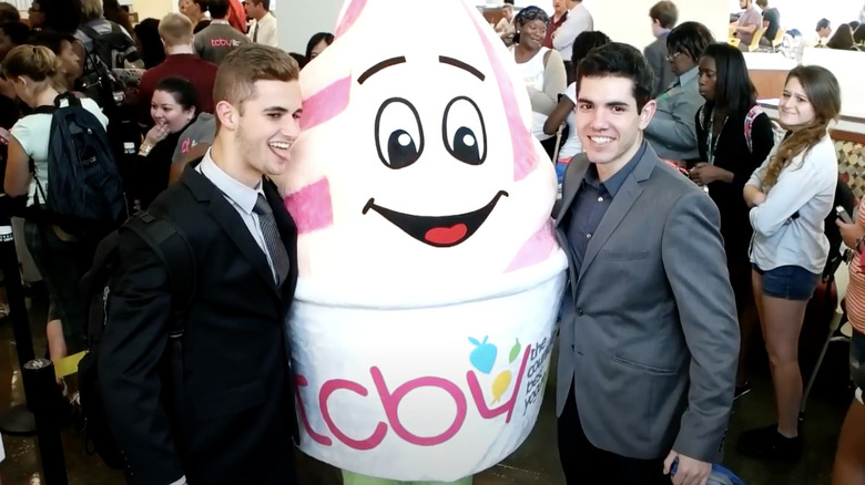 TCBY costumed mascot with fans