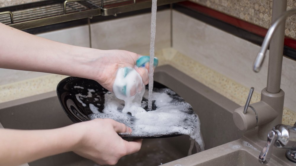 washing dishes on The Great British Baking Show