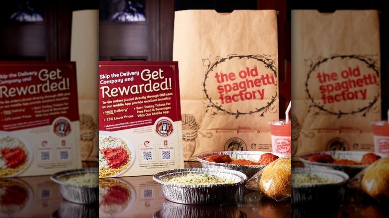 Takeout meal at Old Spaghetti Factory with rewards flyer