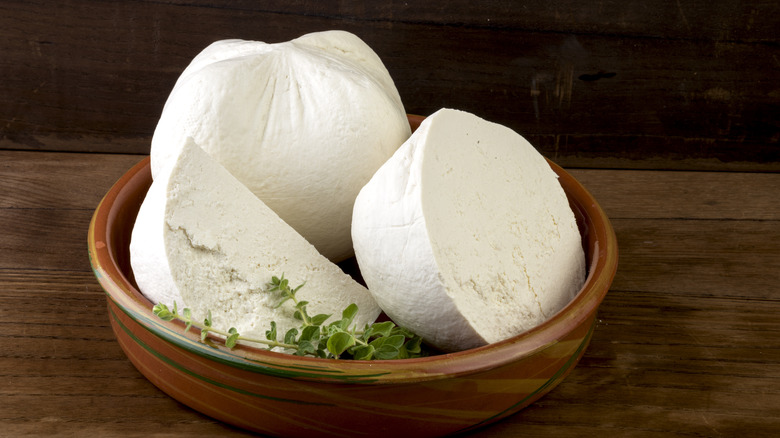 Mizithra cheese balls in a wooden bowl