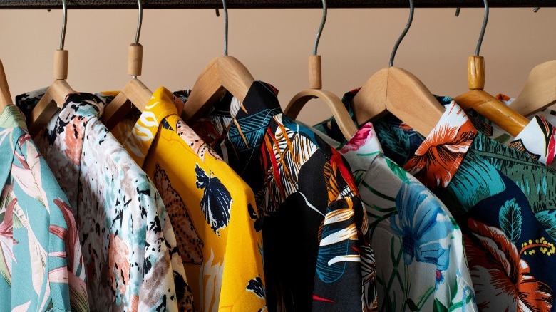 Tropical shirts on hangers