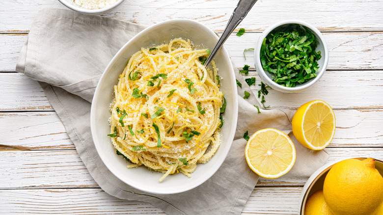 Lemon pasta in a bowl with grated cheese