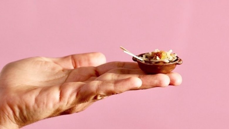 person holding tiny noodles 