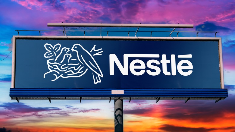 Nestle billboard and a sunset