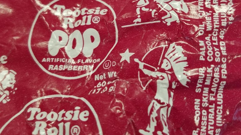 Candy wrapper with image of a boy shooting a star with bow and arrow