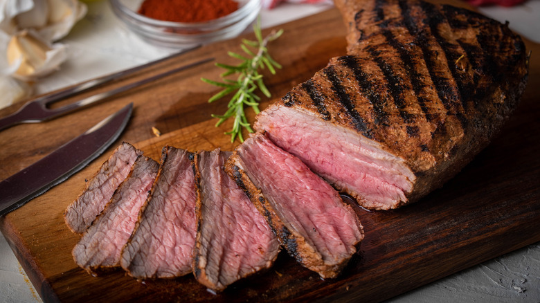 grilled tri tip steak sliced with rosemary