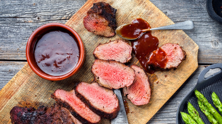 frilled sliced tri tip steak with bbq sauce