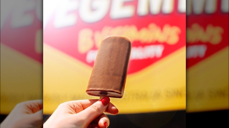 hand holding vegemite popsicle