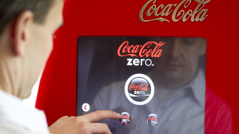 Man uses Coca-Cola Freestyle machine