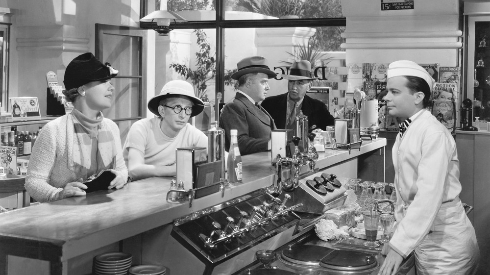 Black and white photo of a soda fountain