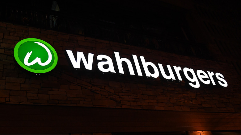 wahlburgers sign at night