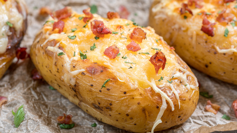 Stuffed baked potatoes with bacon and cheese