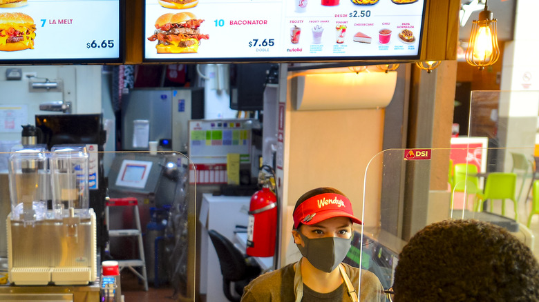 Overseas Wendy's counter with menu