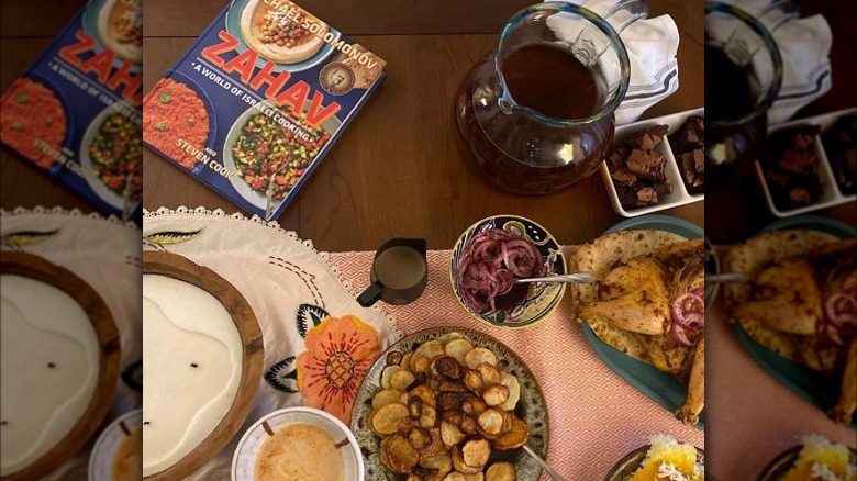 spread of food with roast chicken