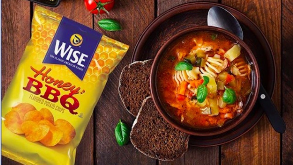 bag of Wise potato chips with bowl of soup