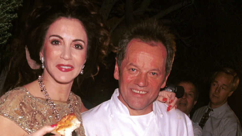 Barbara Lazaroff and Wolfgang Puck at a party