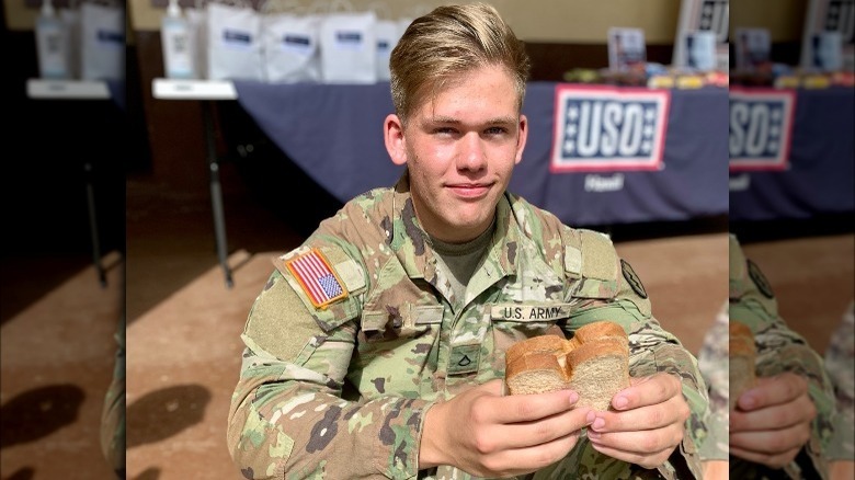 U.S. soldier eating sandwich