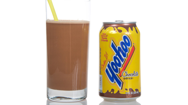 Can of Yoo-Hoo next to a glass of Yoo-Hoo