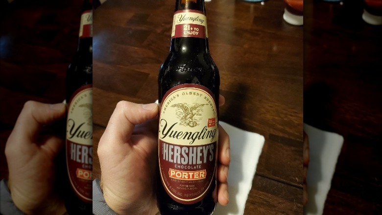 Person holding Yuengling Hershey's bottle