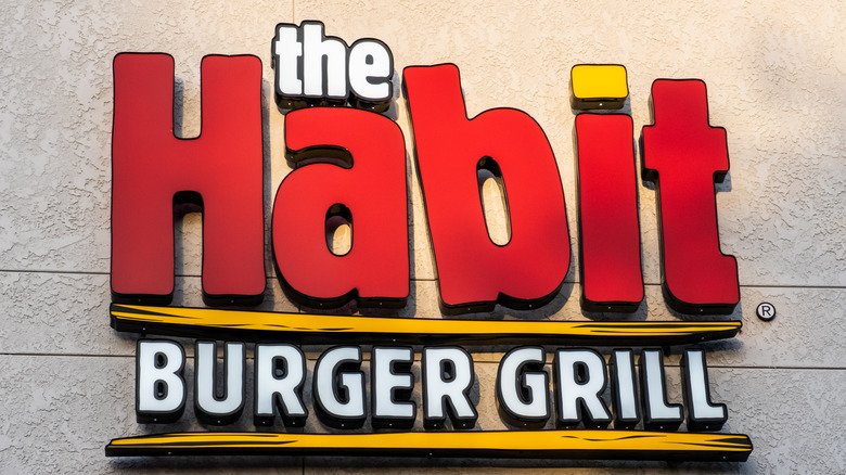 Habit Burger Grill sign on a wall