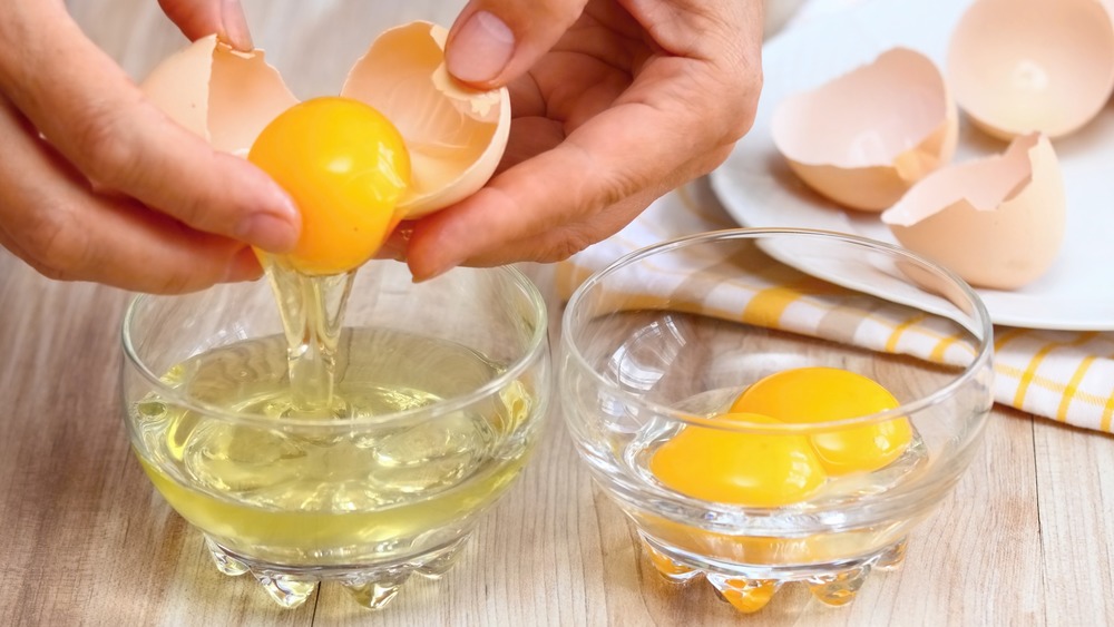 Cracking raw eggs