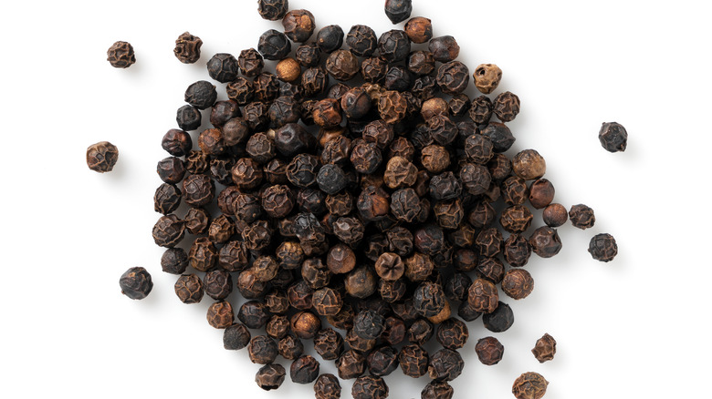 black pepper on white background