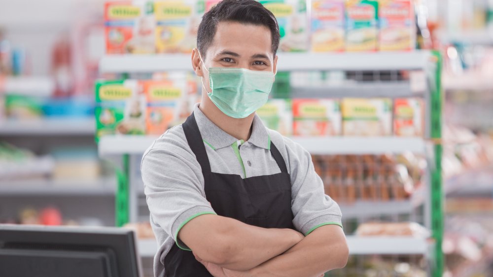 Storekeeper with mask