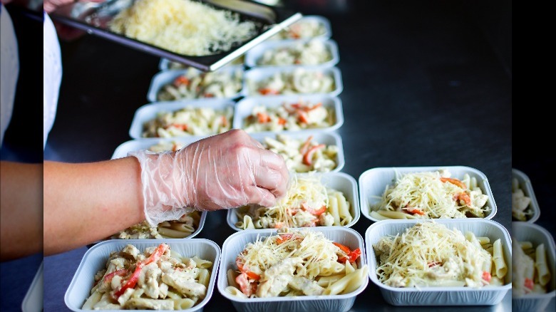 fast-food worker preparing dishes