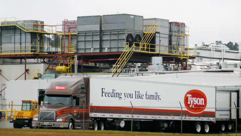 semi truck at loading dock of poultry processing plant