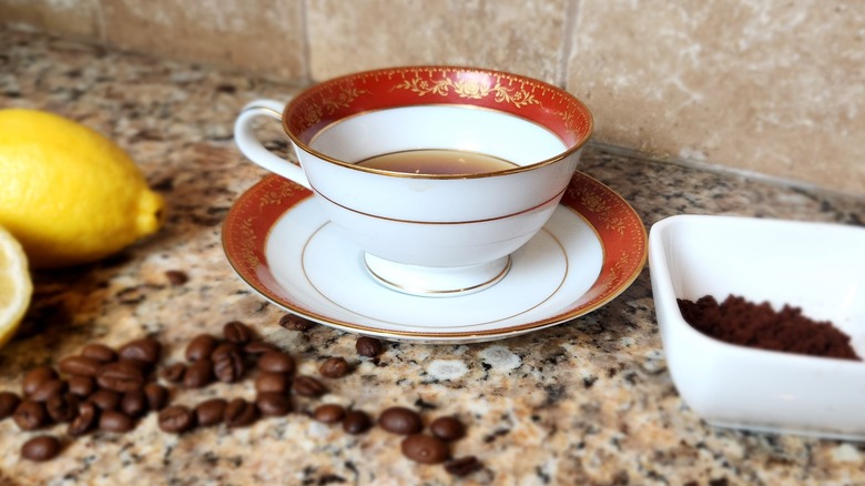 instant coffee with lemons and coffee beans