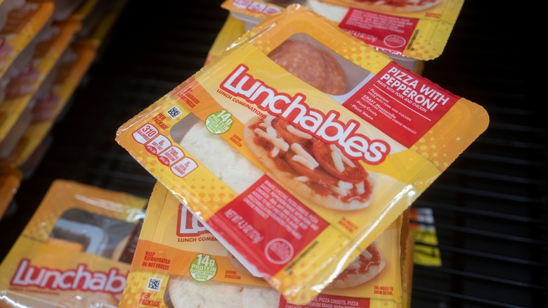 Lunchables pizza meal on shelf