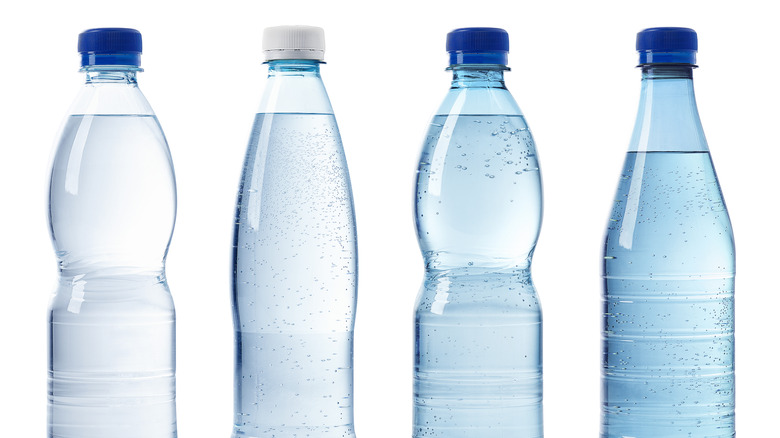 plastic bottles of still and sparkling water