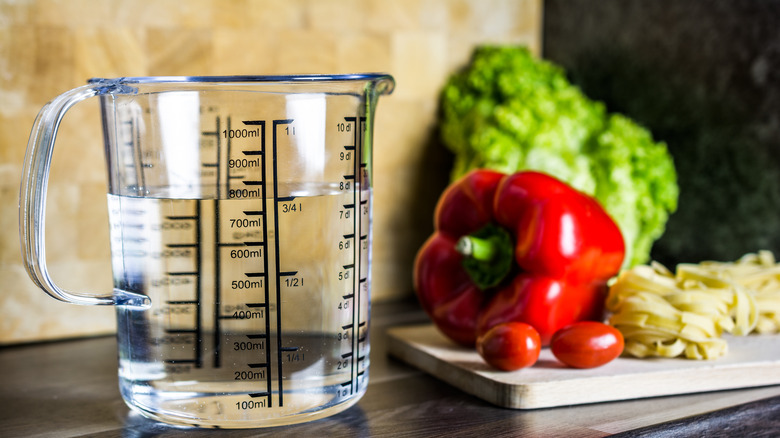 measuring cup of water