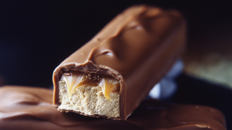 Cross-section of a chocolate bar with nougat and caramel